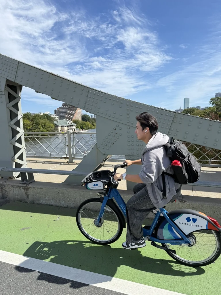 Aiden exploring the city by bike