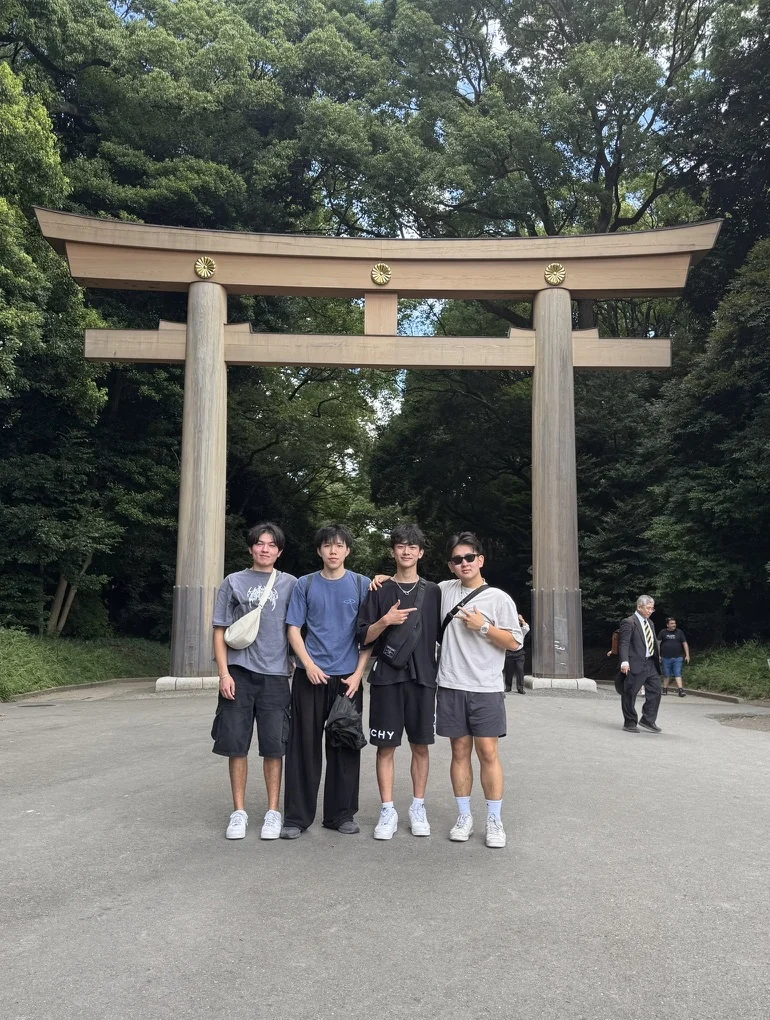 Aiden and friends at a torii gate in Japan